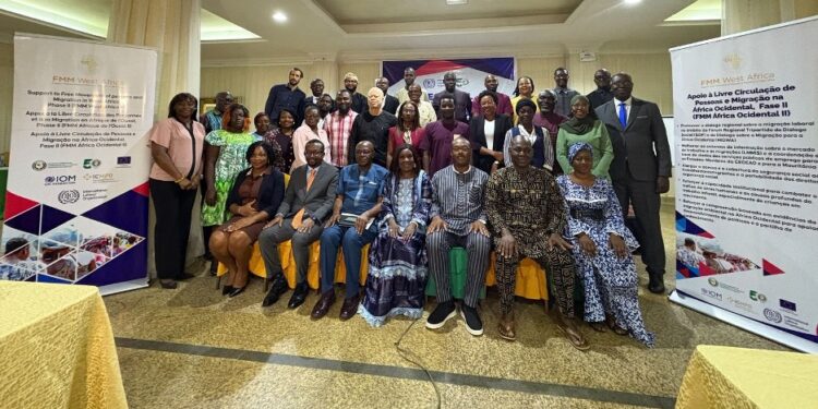 Group photo of ILO, ECOWAS officials, journalists, and partners at Abuja workshop on labor migration and decent work