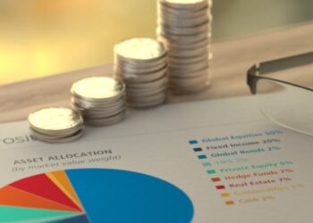 Stacked coins and investment chart showing asset allocation, symbolizing foreign investment and economic strategy in Liberia
