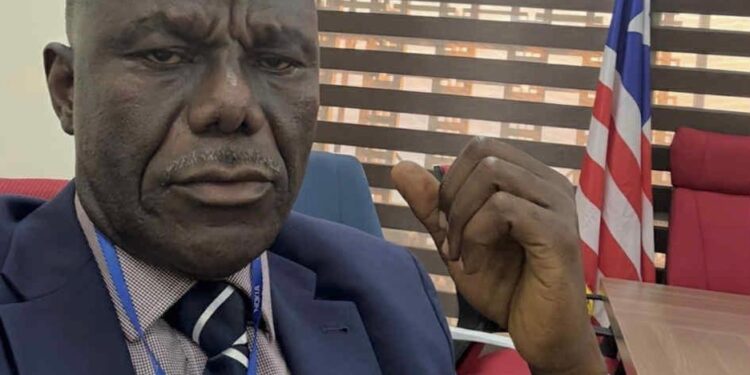 Unity Party stalwart and former Deputy Transport Minister J. Ebenezer Kolliegbo at his office as he urges lawmakers to suspend controversial LTM concession deal