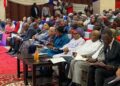 Liberian dignitaries including President Boakai, former President Sirleaf, and lawmakers attend the launch of the National Reconciliation, Healing, and Unity Program at the EJS Ministerial Complex in Monrovia.