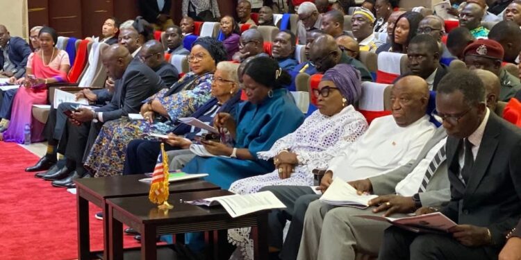 Liberian dignitaries including President Boakai, former President Sirleaf, and lawmakers attend the launch of the National Reconciliation, Healing, and Unity Program at the EJS Ministerial Complex in Monrovia.