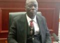 Justice Yamie Quiqui Gbeisay seated in a courtroom after his unanimous confirmation as Chief Justice of Liberia in July 2025