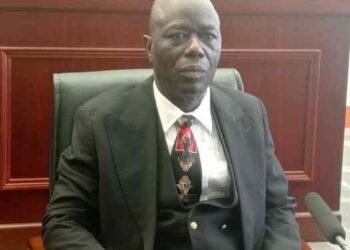 Justice Yamie Quiqui Gbeisay seated in a courtroom after his unanimous confirmation as Chief Justice of Liberia in July 2025