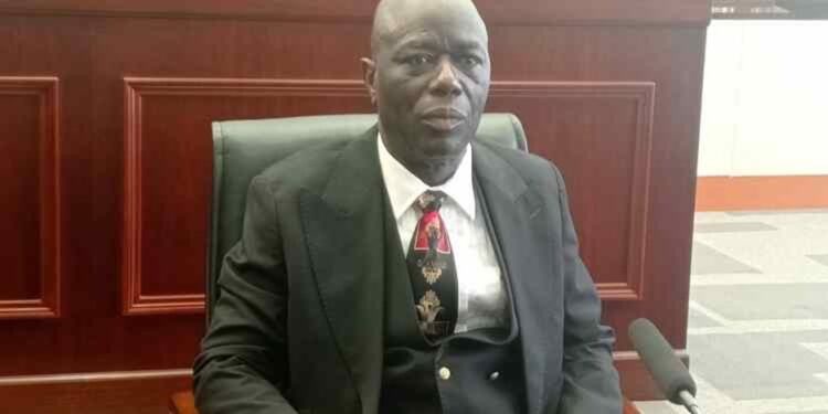 Justice Yamie Quiqui Gbeisay seated in a courtroom after his unanimous confirmation as Chief Justice of Liberia in July 2025