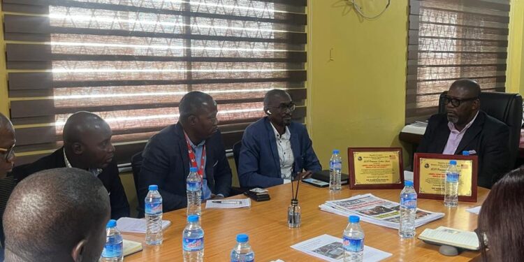 Acting DG Dan T. Saryee in a meeting with LACRA staff members