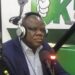 Christopher D. Sankolo, suspended Director General of LACRA, speaks during a radio interview at OK FM amid financial misconduct allegations related to a UBA account.