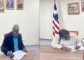 LMHRA Managing Director Dr. Luke Bawo and Deputy Director Dr. Patricia Quaye-Freeman signing the PMCS performance contract in Monrovia