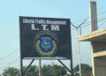 Signboard of Liberia Traffic Management Incorporated (LTMI) bearing the Liberia National Police logo, now at the center of a Senate-ordered investigation over a controversial concession deal.