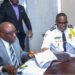 Inspector General Gregory Coleman and AME University President Rev. Dr. Alvin E. Attah sign an MOU to enhance police training and academic collaboration in Liberia.