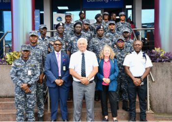 Group photo of Liberia Revenue Authority anti-smuggling officers with IMF experts Kevin Atkison and Jacqueline Penfold at the launch of a customs training mission in Monrovia