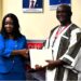 LACC Chairperson Cllr. Alexandra Zoe and LRA Commissioner General James Dorbor Jallah shake hands after announcing 100% asset declaration compliance