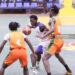 Liberia U-16 guard drives between two Benin defenders during a 98-38 victory at the FIBA AfroBasket Zone 3 qualifiers in Paynesville
