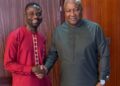 Ghanaian journalist Manasseh Azure Awuni meets and shakes hands with former President John Dramani Mahama after commending him for ending Zoomlion’s controversial sanitation contract.