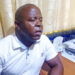 NEC Upper Nimba Magistrate Milton Paye discusses voter card replacement statistics in his Sanniquellie office