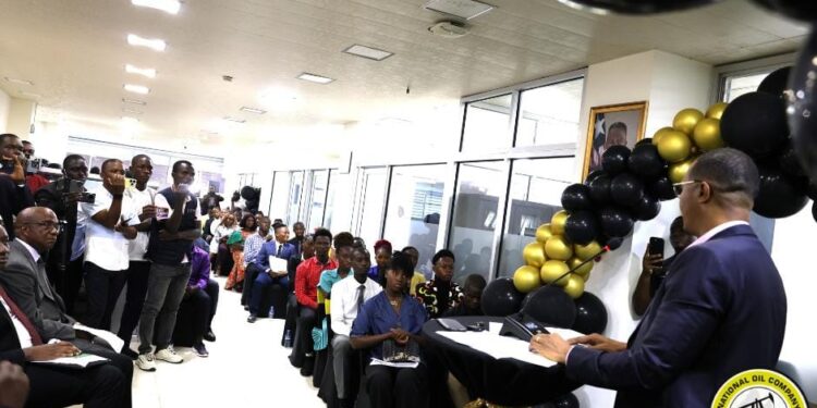 NOCAL President Fabian M. Lai speaks at scholarship award ceremony attended by students, officials, and family members in Monrovia