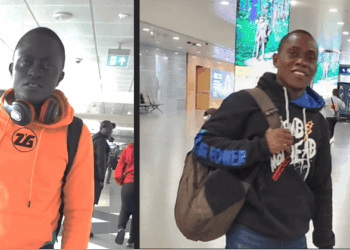 Liberian journalists Blamo N. Toe and Nyantee S. Togba pictured at an international airport en route to China for a 14-day media training seminar representing The Liberian Investigator.