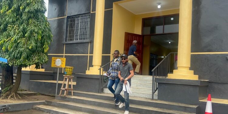 Peach H. Bility escorted from Criminal Court 'C' at the Temple of Justice in Monrovia after being sentenced to four years for drug and weapons charges