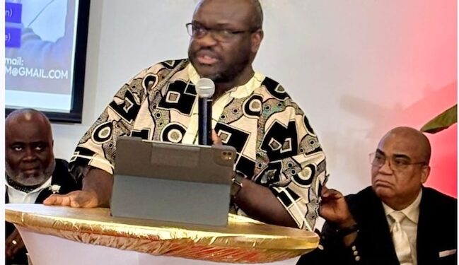 Rev. Alexander B. Collins delivers a passionate keynote at a Liberian Independence Day gathering in Minnesota, calling on the diaspora to transition from complaints to hands-on governance and reform.