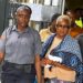 Rita Sarta William escorted by prison officer after being sentenced for drug trafficking at Criminal Court C in Monrovia