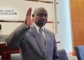 Cllr. Boakai Kanneh raises his hand during his confirmation as Associate Justice of the Supreme Court of Liberia, following a unanimous Senate vote on July 24, 2025.