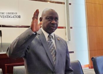 Cllr. Boakai Kanneh raises his hand during his confirmation as Associate Justice of the Supreme Court of Liberia, following a unanimous Senate vote on July 24, 2025.