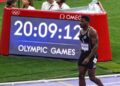 Liberian sprinter Emmanuel Matadi walks off track at the 2024 Paris Olympics after his final race, announcing retirement on Liberia’s Independence Day.