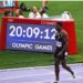 Liberian sprinter Emmanuel Matadi walks off track at the 2024 Paris Olympics after his final race, announcing retirement on Liberia’s Independence Day.