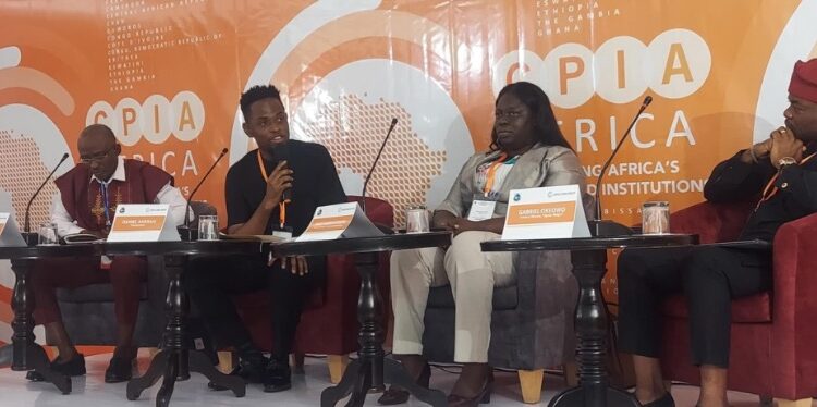 Panelists from Liberia and Nigeria discuss public service delivery failures at the World Bank CPIA launch in Monrovia, calling for better use of public resources and citizen inclusion