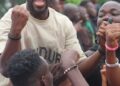 Fans celebrate passionately during a Z-Billion Allstar Tournament match in Paynesville, Liberia — a grassroots football event keeping the sport alive in the off-season.