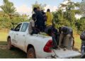 FDA patrol vehicle carrying arrested Burkinabé cocoa farmers suspected of clearing protected forestland in Grand Gedeh County