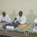 Four senior Catholic bishops of Côte d’Ivoire seated at a press conference table in Abidjan, delivering a pastoral letter on electoral reform ahead of the 2025 presidential election.