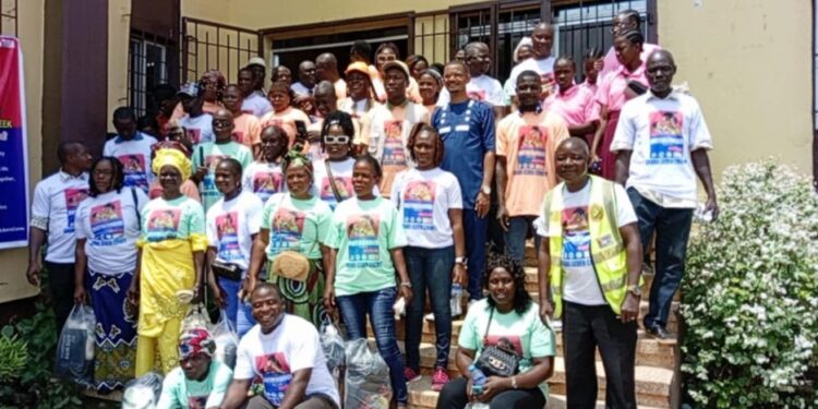 Community health workers and partners pose at the Safe Motherhood Week launch in Zwedru, Grand Gedeh County