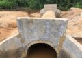 A newly constructed concrete culvert in Pleebo, Maryland County, designed to reduce flooding and improve drainage along key community roads.