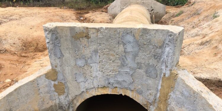 A newly constructed concrete culvert in Pleebo, Maryland County, designed to reduce flooding and improve drainage along key community roads.