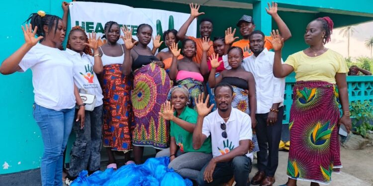 Heartfelt Hands Liberia Initiative donates maternity kits to pregnant women in Bong County ahead of Independence Day, with support from student nurses.