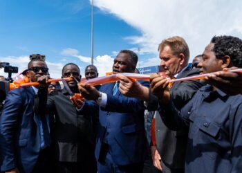 Vice President Jeremiah Koung cuts ribbon to launch 24-hour operations at the Freeport of Monrovia alongside APM Terminals and port authority officials.