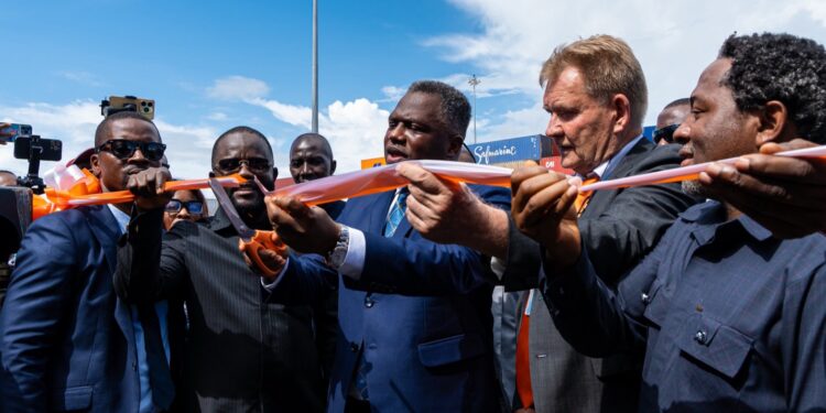 Vice President Jeremiah Koung cuts ribbon to launch 24-hour operations at the Freeport of Monrovia alongside APM Terminals and port authority officials.