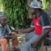 Jefferson Togbah Mansah interviews a rural farmer as LAEJN marks 10 years of advancing agriculture journalism and farmer-focused media in Liberia.