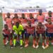 Montserrado County high school football team poses for a group photo during the National High School Football and Kickball Championship.