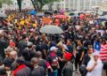 Thousands of Liberians rally in Monrovia demanding government action against the national drug crisis.