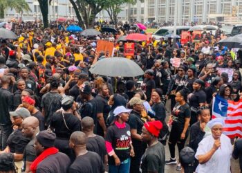 Thousands of Liberians rally in Monrovia demanding government action against the national drug crisis.