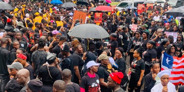 Thousands of Liberians rally in Monrovia demanding government action against the national drug crisis.