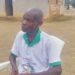 Elderly man being interviewed about Gbarney Public School’s challenges in Bong County, Liberia.