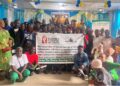 Group photo of AFELL, Clooney Foundation representatives, and West Point residents during a community outreach on drug abuse and domestic violence in Monrovia.