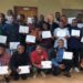 Group photo of participants and staff from ArcelorMittal Liberia Training Academy and African Bible College University after teacher training completion