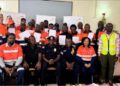 ArcelorMittal Liberia drivers and officials pose for a group photo after completing the international-standard Defensive Driving Program in Buchanan.