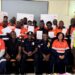 ArcelorMittal Liberia drivers and officials pose for a group photo after completing the international-standard Defensive Driving Program in Buchanan.