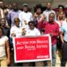 Group photo of ActionAid Liberia staff and youth-led organizations holding a banner for the Youth AHEAD Project launch focused on rights and social justice.
