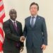 Agriculture Minister Dr. Alexander Nuetah shakes hands with Mainland Group CEO Zhu Chen during announcement of $100M Liberia agriculture investment.