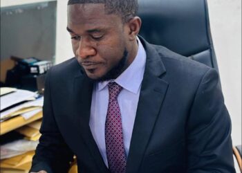 Justice Minister Oswald Tweh working at his office amid clarification that he did not boycott former Chief Justice Yuoh’s retirement ceremony in Monrovia